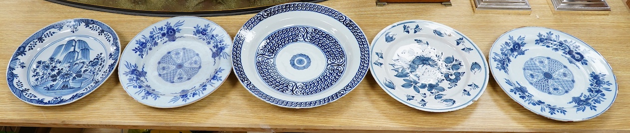 Five various delft dishes, largest 37cm diameter. Condition - poor to fair